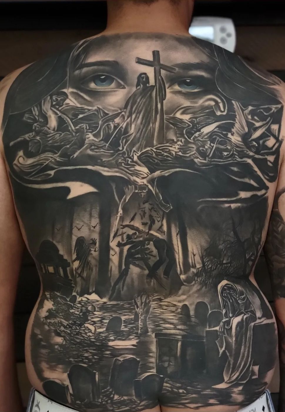 Religious black and grey full-back piece
